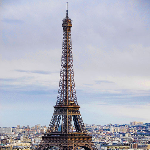 The Eiffel Tower dominating the skyline of Paris.