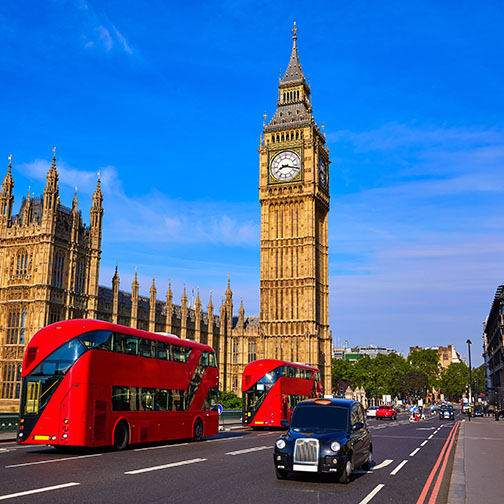 London scene with Big Ben, Palace of Westminster, red double-decker busses and black taxicabs