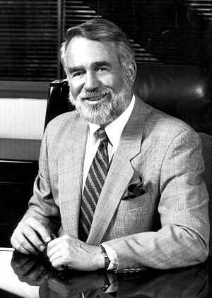 Sid Craig wearing a suit